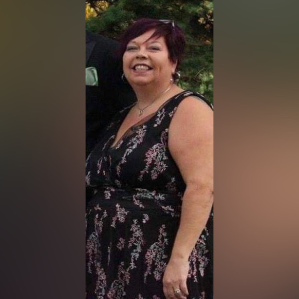 Black dress with pretty floral pattern - size 22